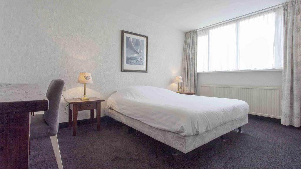 Hotel De Beurs Гофддорп Номер фото